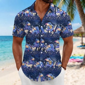 May include: A short-sleeved button-down shirt in a dark blue hue featuring a repeating pattern of the character Eeyore, palm trees, and outlined rose motifs. The shirt has a classic collar, a front button placket, and a straight hemline design.