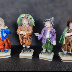 Set of 4 impeccable Saxon porcelain figures