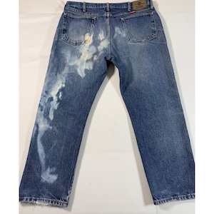 May include: A set of three ceramic mugs with a speckled, matte finish. The mugs are in shades of cream, light gray, and dark gray. Each mug has a simple, minimalist design, perfect for coffee or tea.