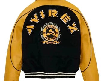 Chaqueta Avirex de lana negra con mangas de cuero para hombre, estilo aviador clásico americano.