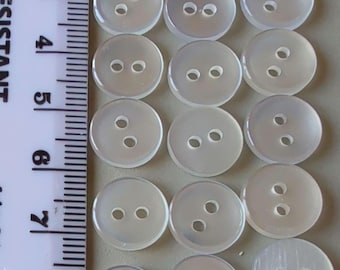 22 x 11,5 mm helt genomskinliga knappar med 2 syhål