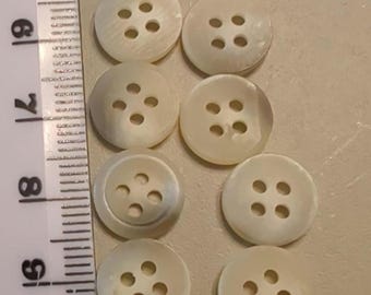 Vintage krämfärgade knappar med silverfärgade streck, 4 syhål (24 x 10,5 mm)