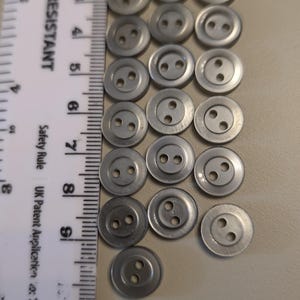 25 x 11mm light grey translucent shirt buttons with 2 sewing holes