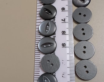 20 x 14 mm mörkgrå fisheye-knappar