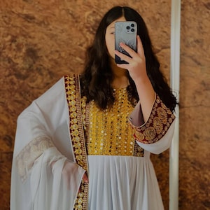 Elegant White Traditional Dress with Golden Embroidery