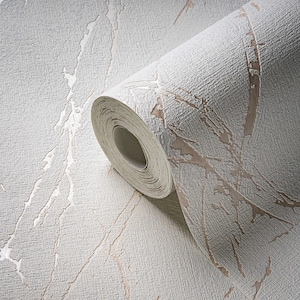 May include: A roll of textured wallpaper in shades of gray and beige. The design features a marbled effect with streaks of lighter gray and beige, creating a natural, organic pattern. The paper has a subtle, embossed texture.