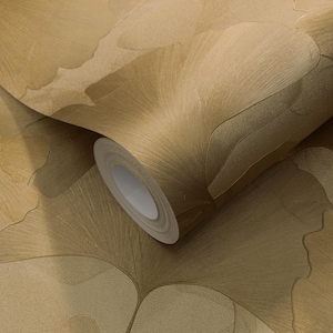 May include: A roll of wallpaper with a repeating pattern of abstract, petal-like shapes in shades of tan and brown. The design has a textured appearance, with subtle lines and variations in color, creating a sense of depth and dimension.