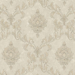May include: Cream-colored wallpaper with a repeating pattern of ornate, stylized floral and leaf motifs. The design features a central medallion shape with symmetrical, scrolling elements in shades of beige and light brown, creating a classic, textured look.