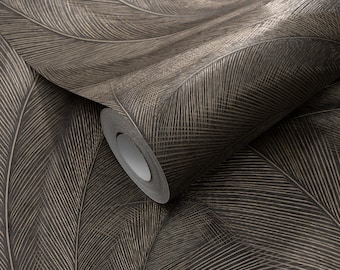 May include: A roll of wallpaper featuring a large feather design in shades of brown and beige. The feathers have detailed veining, creating a textured appearance. The roll is partially unrolled, revealing the paper's pattern.