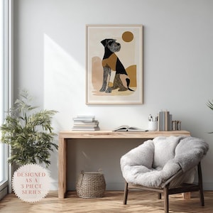 Könnte beinhalten: Ein gerahmter Kunstdruck mit einer stilisierten Hundeillustration in Schwarz-, Braun- und Beigetönen. Das Kunstwerk enthält eine Sonne und abstrakte Landschaftselemente. Der Druck wird über einem Holztisch ausgestellt und wertet die Raumdekoration auf.