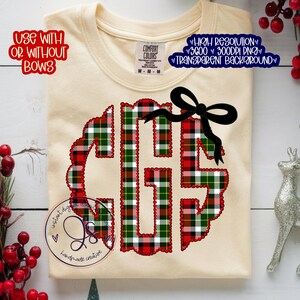 May include: Cream-colored t-shirt featuring a monogram design in red, green, and white plaid, accented with a black bow. The shirt includes text that reads "USE WITH OR WITHOUT BOWS" and "HIGH RESOLUTION 3600 300DPI PNG TRANSPARENT BACKGROUND".