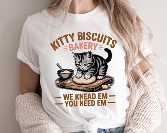Camiseta de Kitty Biscuits Bakery: Divertido meme de gato amasando masa (humor para dueños de mascotas)