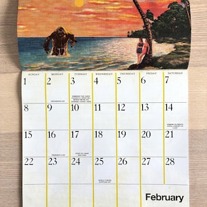 May include: A February calendar page featuring a vintage illustration of a Florida coastal scene with a sunset, palm trees, and a creature in the water. The calendar includes dates, text, and a map.