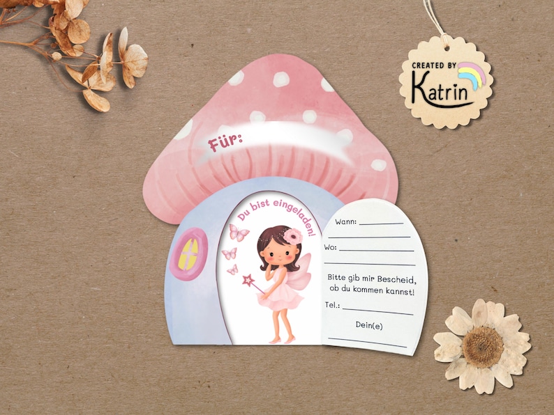 May include: A mushroom-shaped invitation card with a pink cap featuring white spots. The card opens to reveal a fairy illustration with the text 'Du bist eingeladen!' and blank lines for event details including 'Wann', 'Wo', and 'Tel'. A tag reads 'CREATED BY Katrin'.