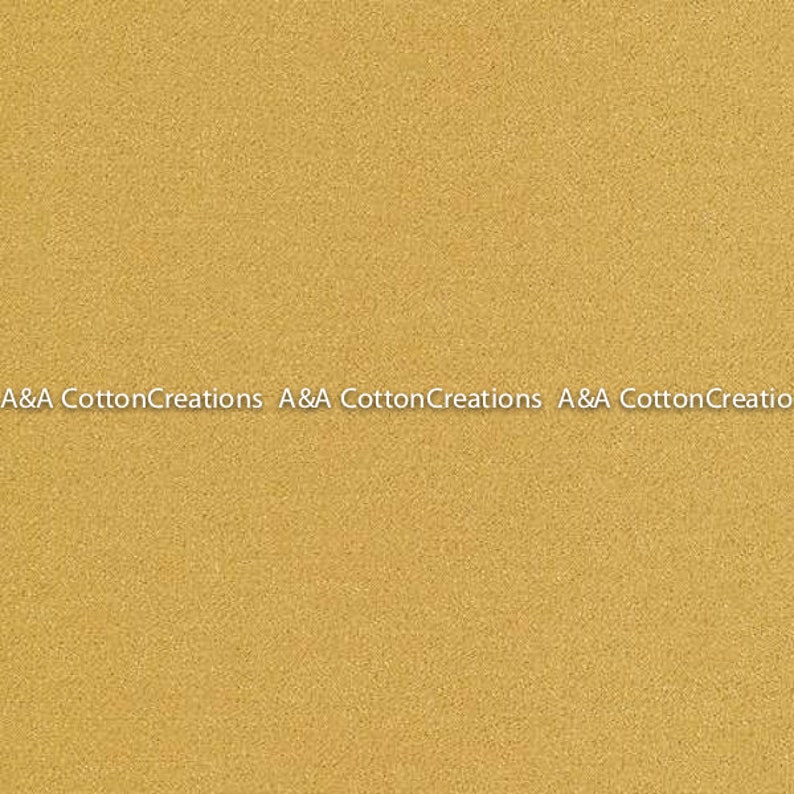 May include: A solid gold fabric with a subtle texture. A&A Cotton Creations is printed at the bottom of the image.