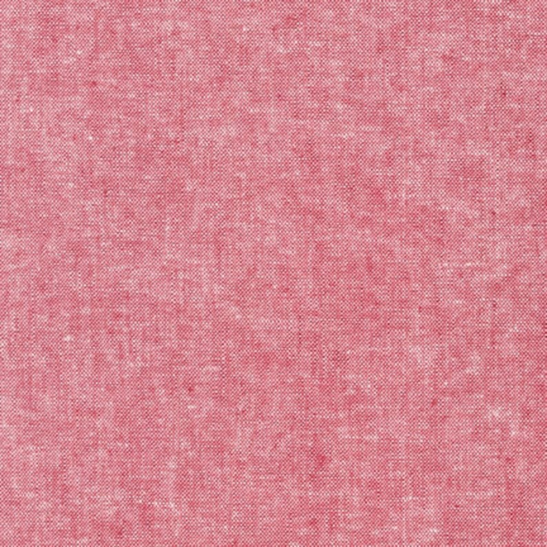 May include: A close-up of a red fabric with a textured woven pattern.
