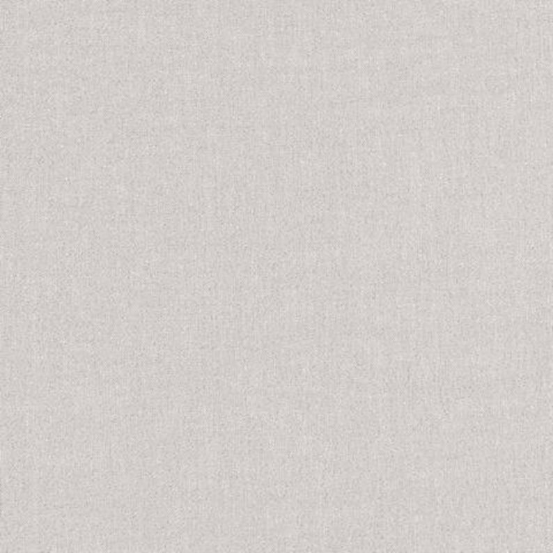 May include: A plain white textured background.