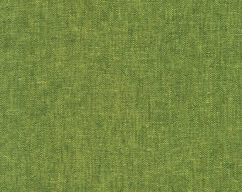 May include: A close-up of a green fabric with a textured weave.