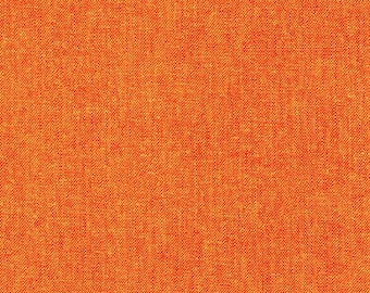 Op de afbeelding: Close-up van een getextureerde oranje stof. Het materiaal heeft een geweven uiterlijk met een consistente kleur en patroon. De textuur van de stof is zichtbaar, wat wijst op een duurzaam textiel.