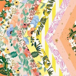 May include: A collection of Rifle Paper Co. Primavera wrapping paper featuring floral and geometric patterns in a variety of colors, including pink, blue, green, yellow, and orange.
