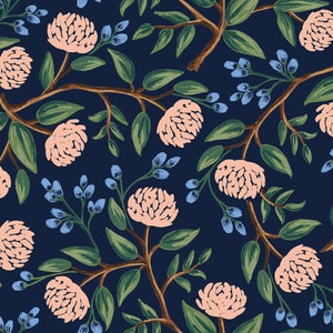 May include: A seamless pattern featuring pink flowers with green leaves and blue berries on a dark blue background.