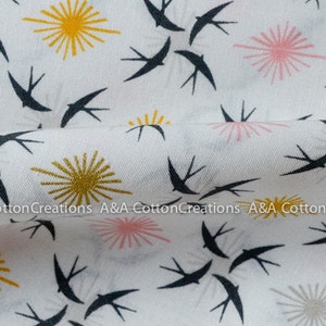 May include: White fabric with a repeating pattern of black swallows and stylized sunbursts in yellow, pink, and gray.