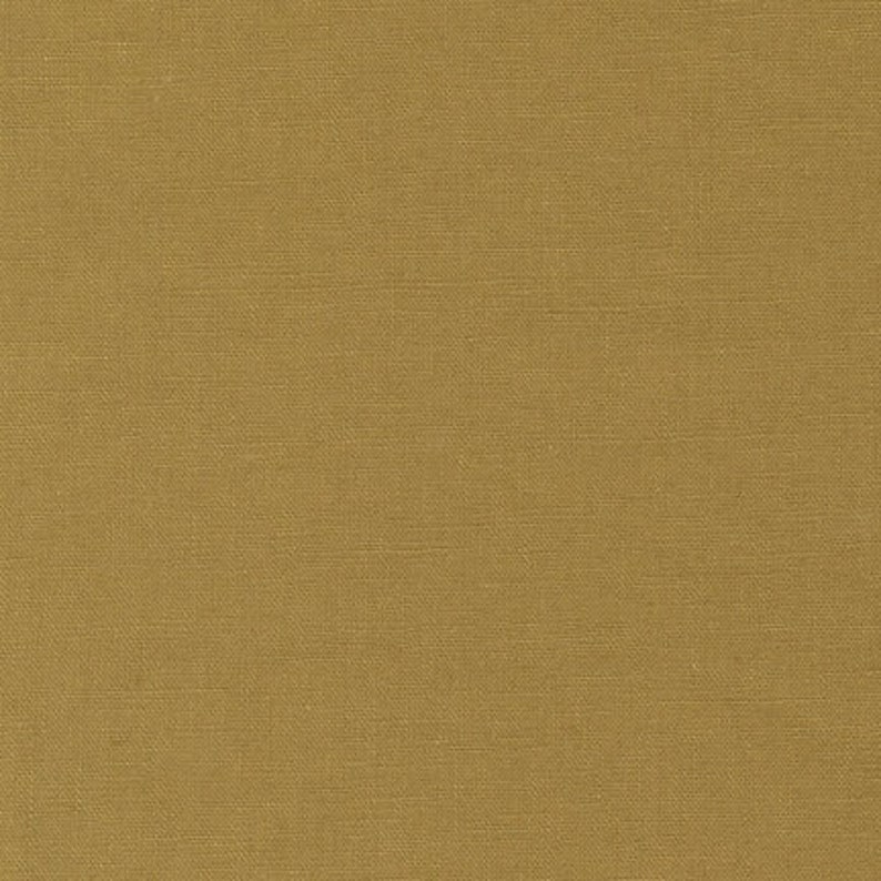 May include: A close-up of a solid brown fabric with a subtle woven texture.