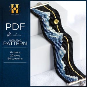 May include: A black loom bead bracelet with a mountain design in shades of blue and white, accented with gold beads. The bracelet is displayed on a white surface. The image also includes text that reads "PDF Mountains Loom Bead Pattern".