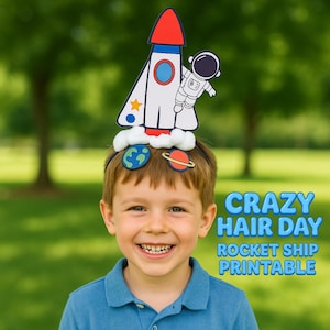 May include: A child wearing a Crazy Hair Day headband with a rocket ship and astronaut design. The headband features a white rocket with red and blue accents, a cartoon astronaut, and planet graphics. The text "CRAZY HAIR DAY ROCKET SHIP PRINTABLE" is visible.