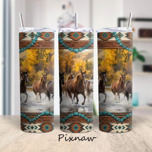 May include: A set of three stainless steel tumblers with a Western-themed design. The design features running horses in a river, with turquoise and geometric patterns. The tumblers have a straw and the text "Pixnaw" at the bottom.