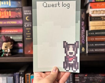 May include: A notepad with the text "Quest log" at the top. The notepad has a pixelated dog graphic on the bottom right corner. The notepad is light green and white.