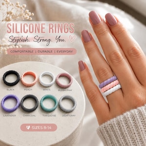 Può includere: Una collezione di anelli in silicone in vari colori tra cui nero, pesca, bianco, rosa cipria, lavanda, antracite, turchese e grigio chiaro. Il testo recita SILICONE RINGS, Stylish. Strong. You., COMFORTABLE | DURABLE | EVERYDAY e SIZES 8-14.