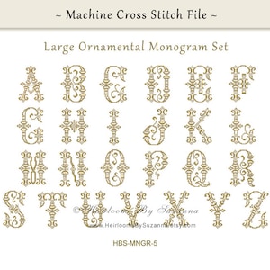 May include: A set of 26 large, ornate, gold-colored monogram letters for machine cross stitch. The letters are in a traditional, decorative font with intricate details. The letters are arranged in alphabetical order.
