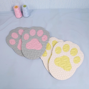 Non slip paw pads crafted in soft foam for furry shoes cosplay or kigurumi use. These handmade accessories are lightweight flexible and easy to attach fitting EU 38 to 43 US mens 6 to 9. With custom color options you can coordinate with your full suit design. Textured soles prevent slipping making them ideal for long wear at conventions photoshoots or playful performance ensuring both safety and fun.