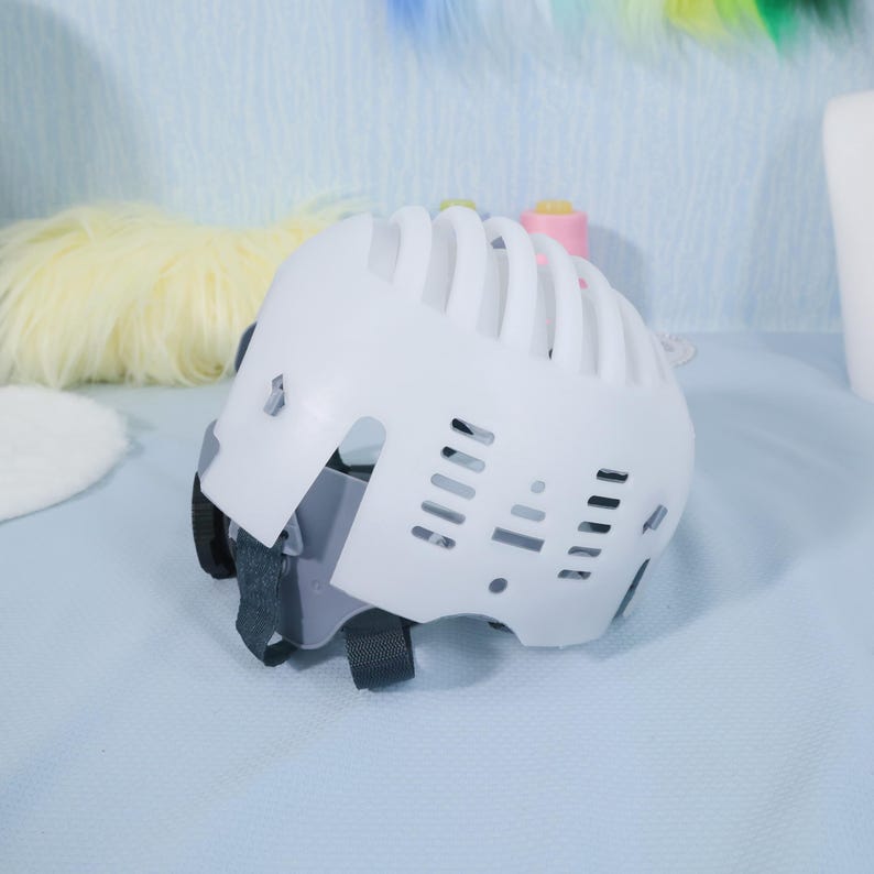 Top-down view of fursuit inner shell showing adjustable cross-straps and USB fan ports. Designed to reduce heat and pressure buildup inside heavy costume heads, this liner helps with airflow and structure. The lightweight material is easy to cut or drill for advanced mods, making it ideal for DIY makers, furry artists, or cosplay engineers crafting kemono or beast heads.