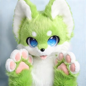 May include: A plush animal head and paws featuring bright lime green and white faux fur. The creature has large, expressive blue eyes with white highlights, a small black nose, a pink tongue, and soft pink paw pads on the front-facing paws.