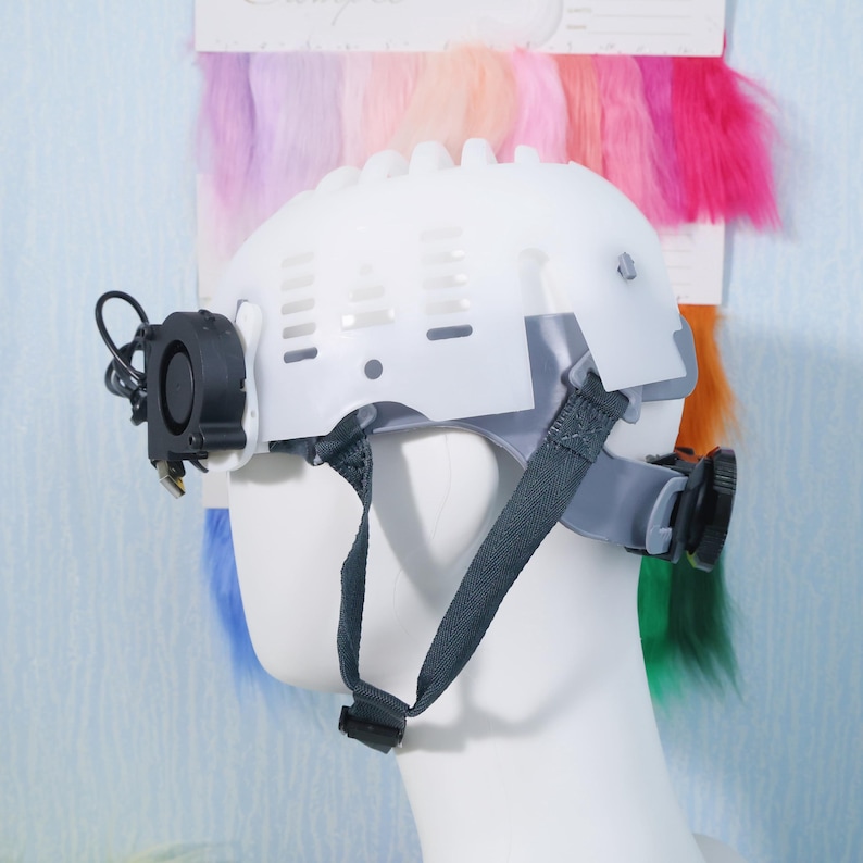 Full set image of the inner helmet liner alongside detachable USB-powered cooling fans, which can be easily installed for better breathability. The fans reduce heat and fog inside the mask, making it ideal for long conventions or summer events. The shell supports foaming, fur wrapping, and other cosplay mods, allowing you to build from a solid internal structure with comfort in mind.