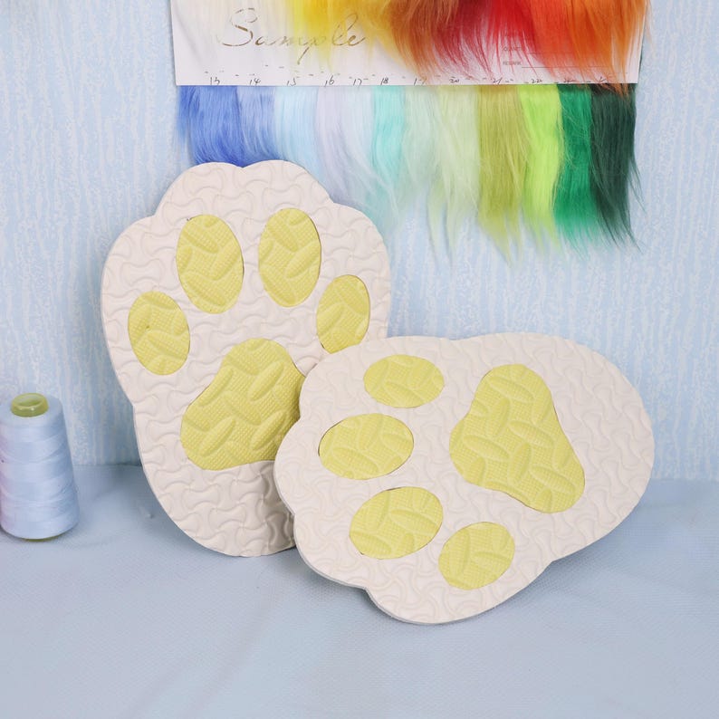 Soft foam paw pads for fursuit shoes made to enhance your cosplay or mascot outfit with playful detail. Sized to fit EU 38 to 43 US 6 to 9. These handmade non slip soles are designed to be both practical and comfortable ensuring you can move confidently. Choose your preferred color to create a unique style. Perfect for furry conventions costume parties or stage events that require both function and charm.