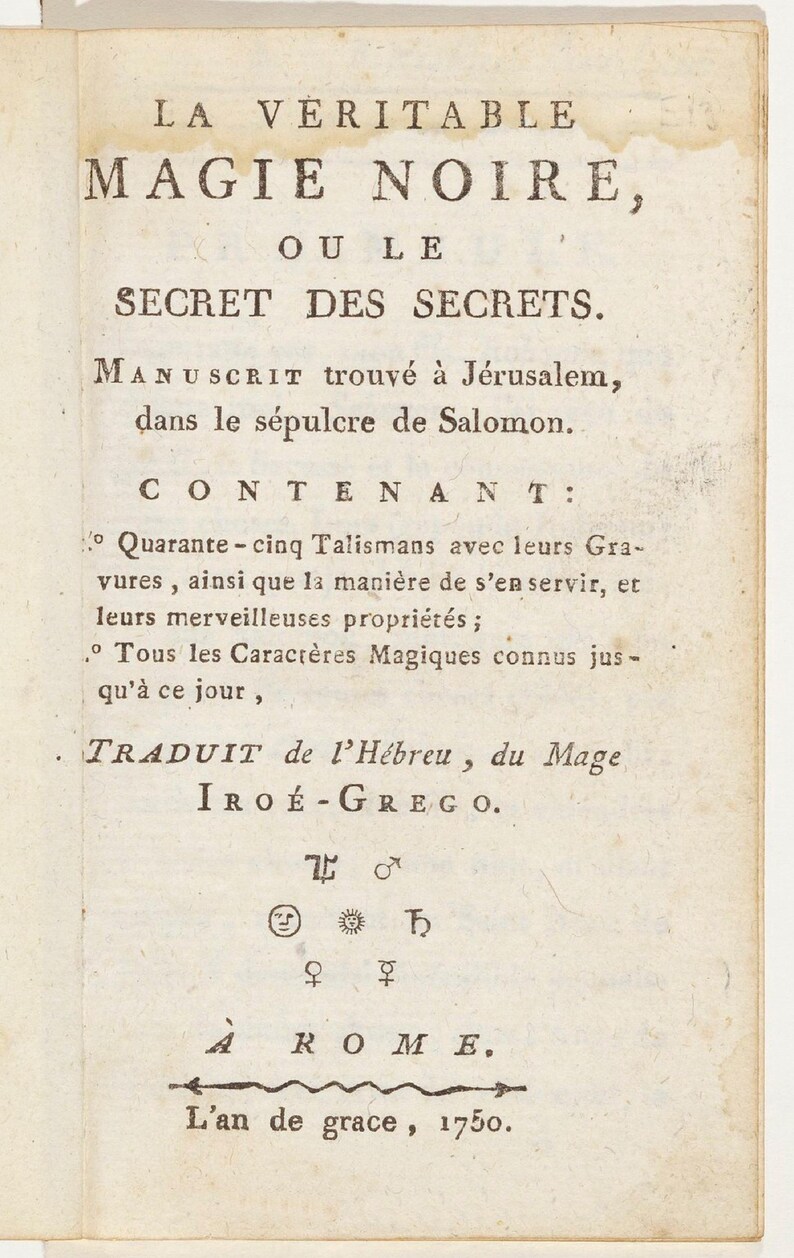 May include: A vintage book page with the title "LA VERITABLE MAGIE NOIRE, OU LE SECRET DES SECRETS." The text is in black ink on aged paper, with symbols and the date 1750. The book is a manuscript.