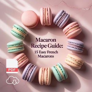 May include: A collection of colorful French macarons arranged in a circle on a pink surface. The macarons are in various pastel colors, including pink, green, and purple. Text reads "Macaron Recipe Guide: 15 Easy French Macarons" with a PDF icon.