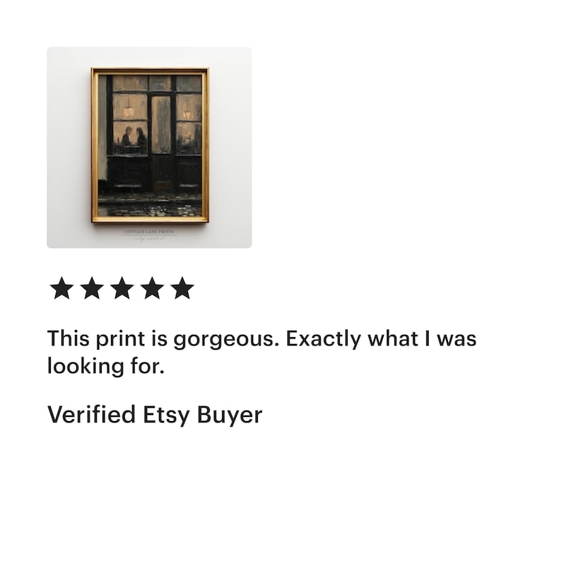 May include: A rectangular framed wall art print depicting a dark storefront exterior at night with two figures visible through the glass windows. The scene features muted brown and black tones, illuminated by soft interior lights, enclosed in a gold frame.