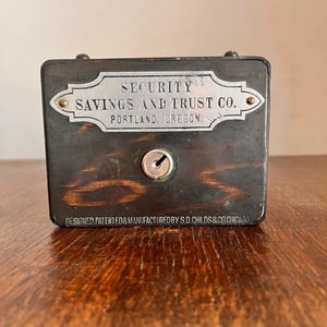 Vintage S. D. Childs Coin Bank