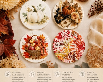May include: A set of four round ceramic coasters featuring autumn-themed illustrations: a white pumpkin, a pumpkin with a candle and envelope, a basket of apples, and a vibrant pattern of red, orange, and yellow maple leaves on a white background.