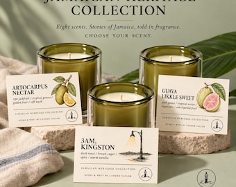 May include: Three olive green glass candles from the Jamaican Heritage Collection. Labels feature illustrations of jackfruit, guava, and a streetlamp with text including Artocarpus Nectar, Guava Likkle Sweet, and 3AM, Kingston by Quire & Weft by Lander Taylor.