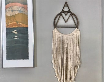 The Seeker Macrame fiber and wood wall hanging