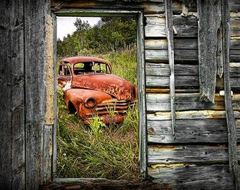 Ravages of Time with Rusted Auto viewed through the Window of a Weathered Wall in Ontario Canada, A Color B&W Sepia Toned Photograph