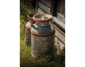 Vintage Creamery Milk Cans by the old Prairie Homestead near the Badlands  in South Dakota No.7561 A Fine Art Still Life Photograph