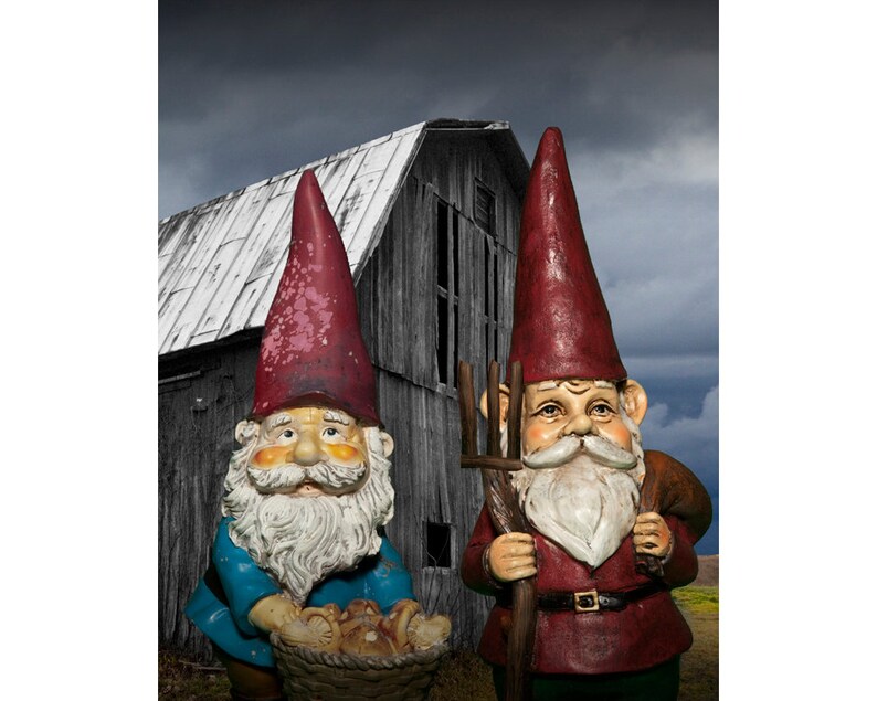 American Gothic Garden Gnomes Standing In Front Of An Old Barn With Pitchfork A Grant Wood Influenced Surreal Fantasy Photograph