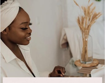 May include: A woman wearing a white shirt and head wrap, with the text "FROM CHAO'S TO CALM: HOW WORKING MOMS CAN PRIORITIZE HEALTH WITHOUT GUILT". A glass vase with wheat stalks sits on a table.