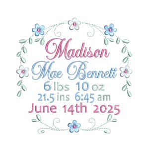 May include: An embroidered design with the name "Madison Mae Bennett" in pink and blue script, surrounded by a floral wreath. The design includes the birth weight of 6 lbs 10 oz, length of 21.5 inches, and birth time of 6:45 am on June 14th, 2025.